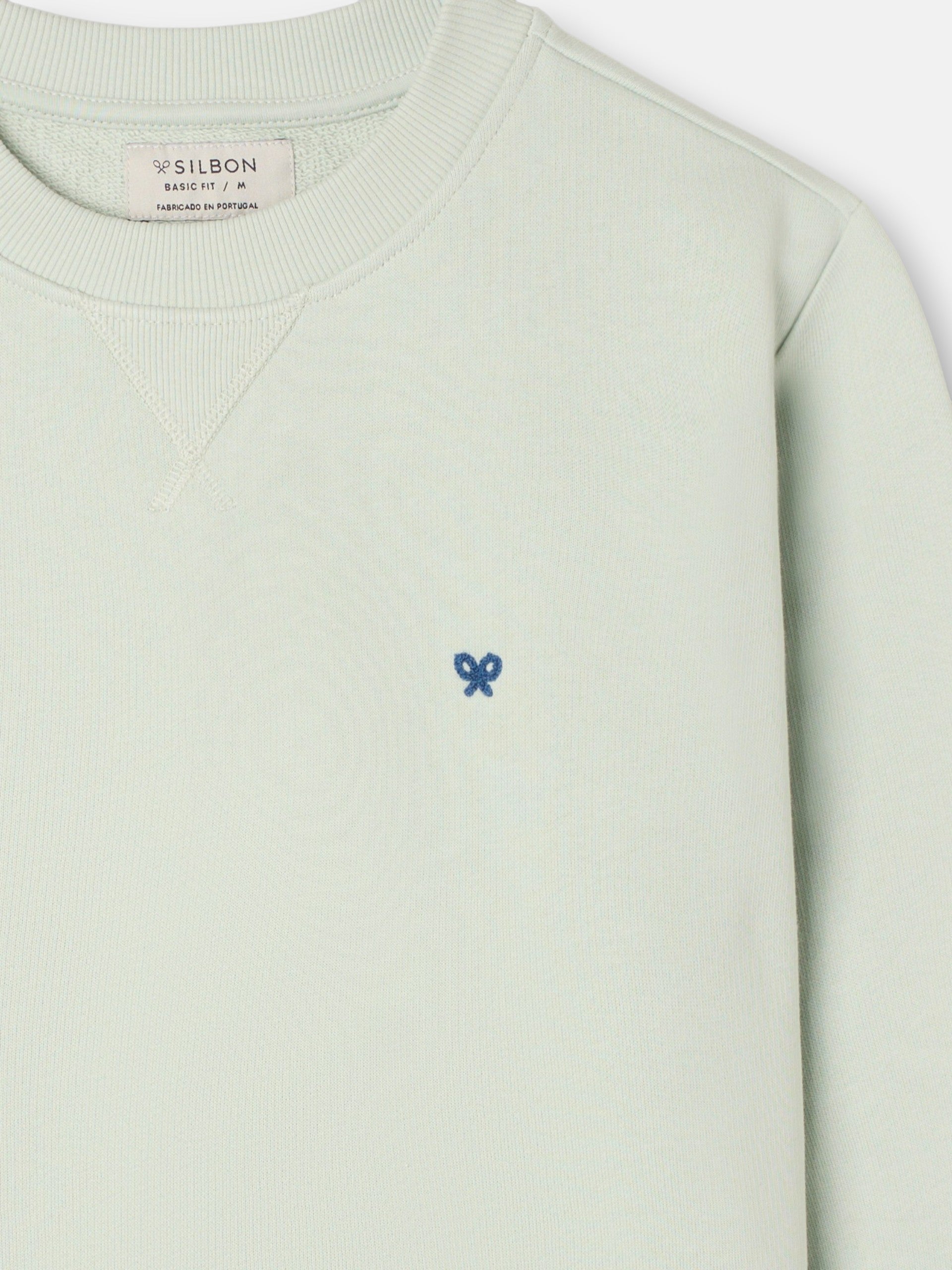 Sudadera lisa minilogo rizo verde claro