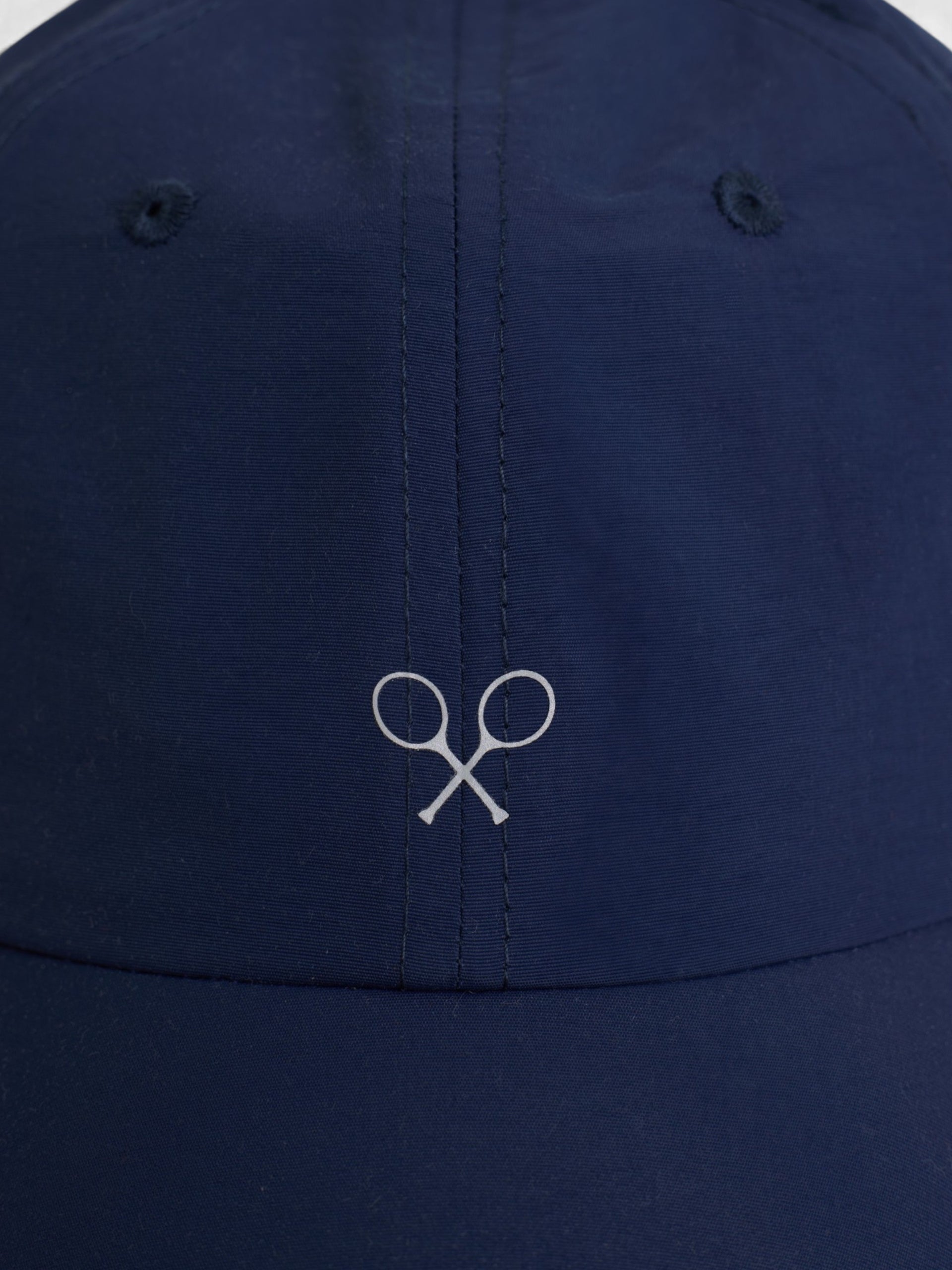 Gorra tejido técnico raquetas azul marino
