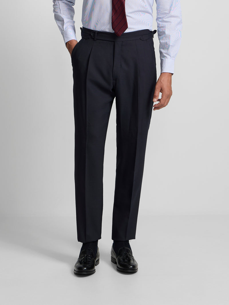 Navy blue pleated dress trousers