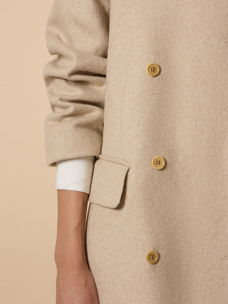 Long unique double-breasted beige coat