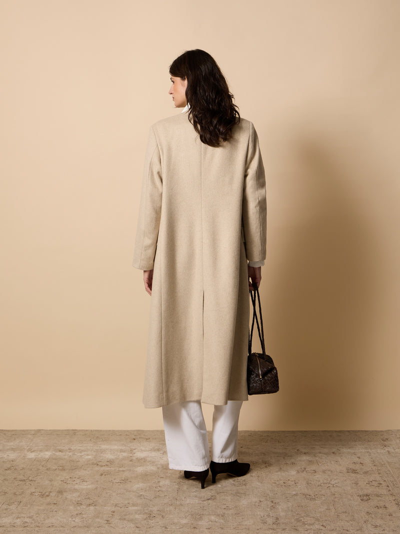 Long unique double-breasted beige coat