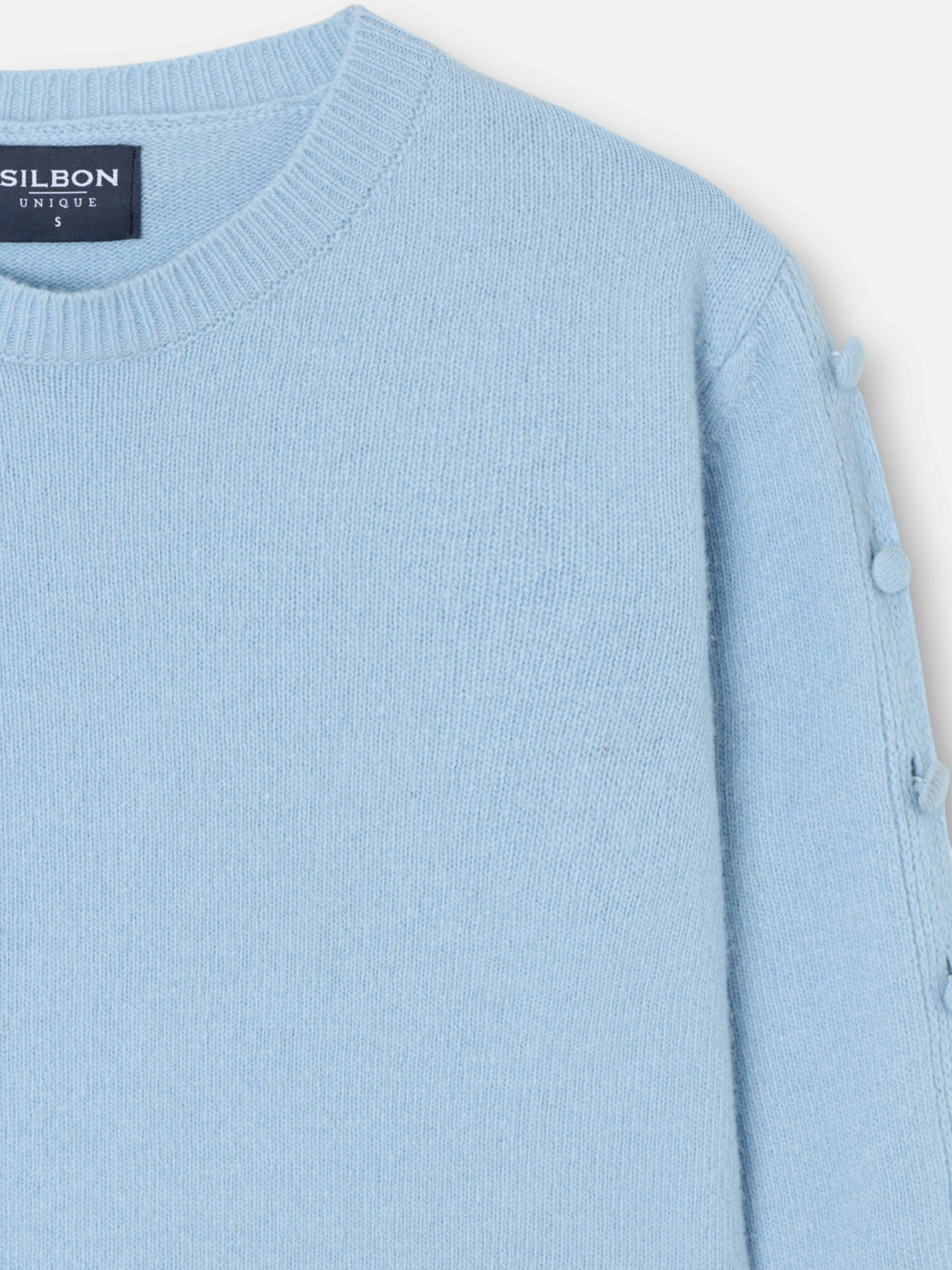 Pull unique à boutons manches bleu ciel