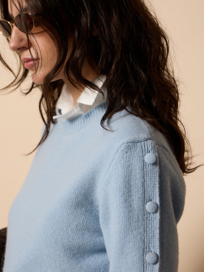 Pull unique à boutons manches bleu ciel