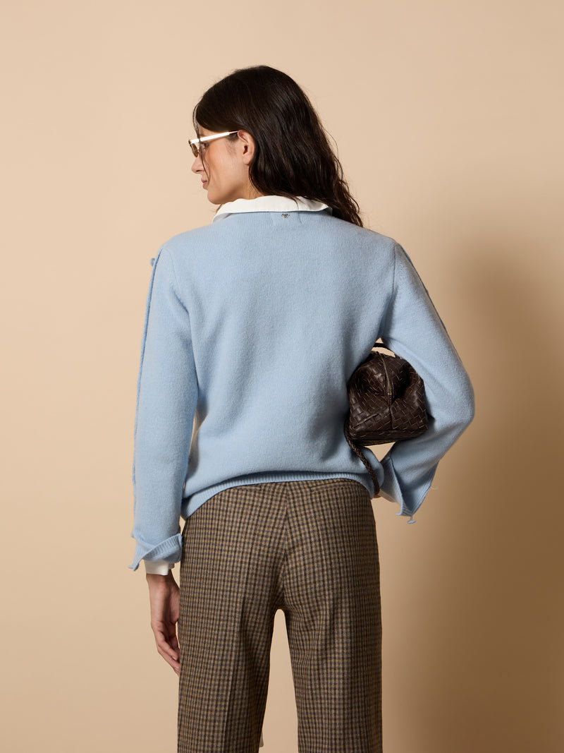 Pull unique à boutons manches bleu ciel