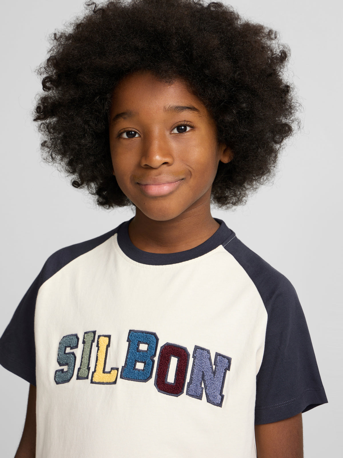 Camiseta kids ranglan varsity azul marino