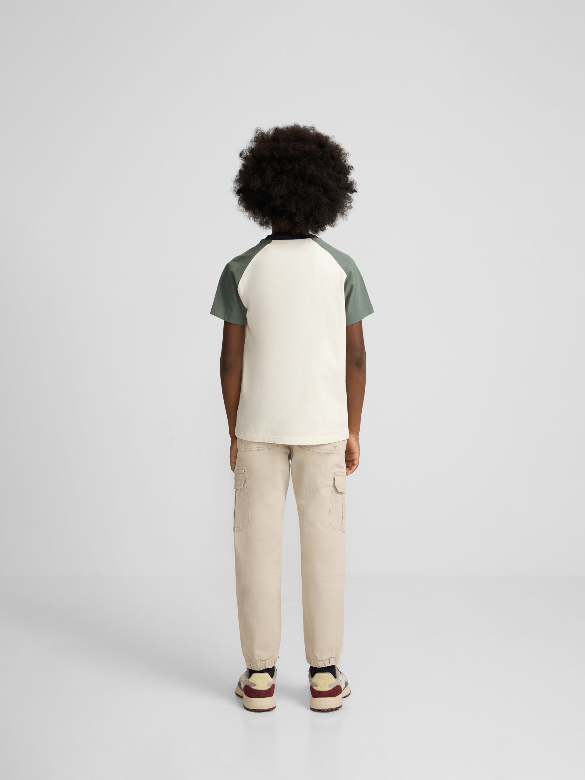 Camiseta kids ranglan varsity verde oscuro