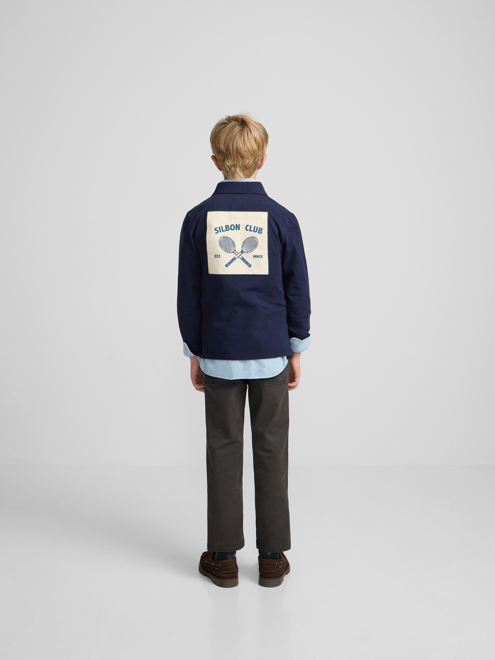 Polo enfant patch bleu marine