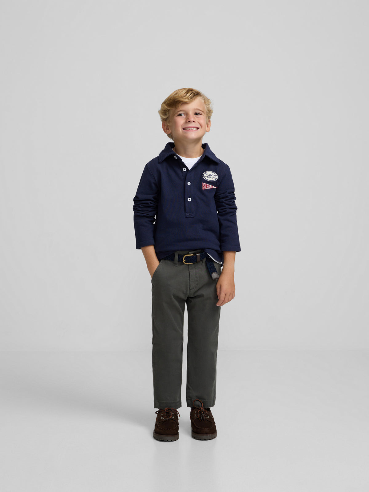 Navy blue kids' polo with patches