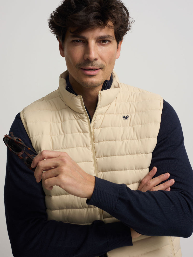Light beige padded vest