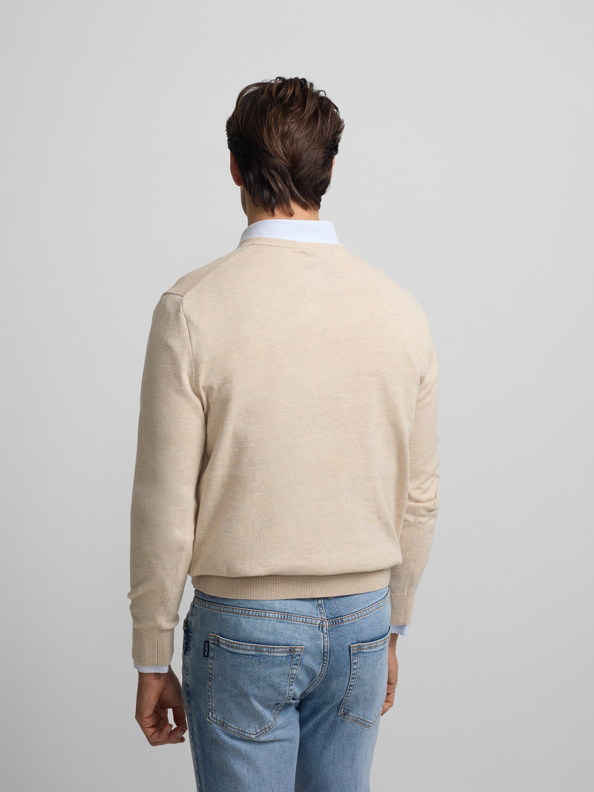 Jersey liso cuello pico crema