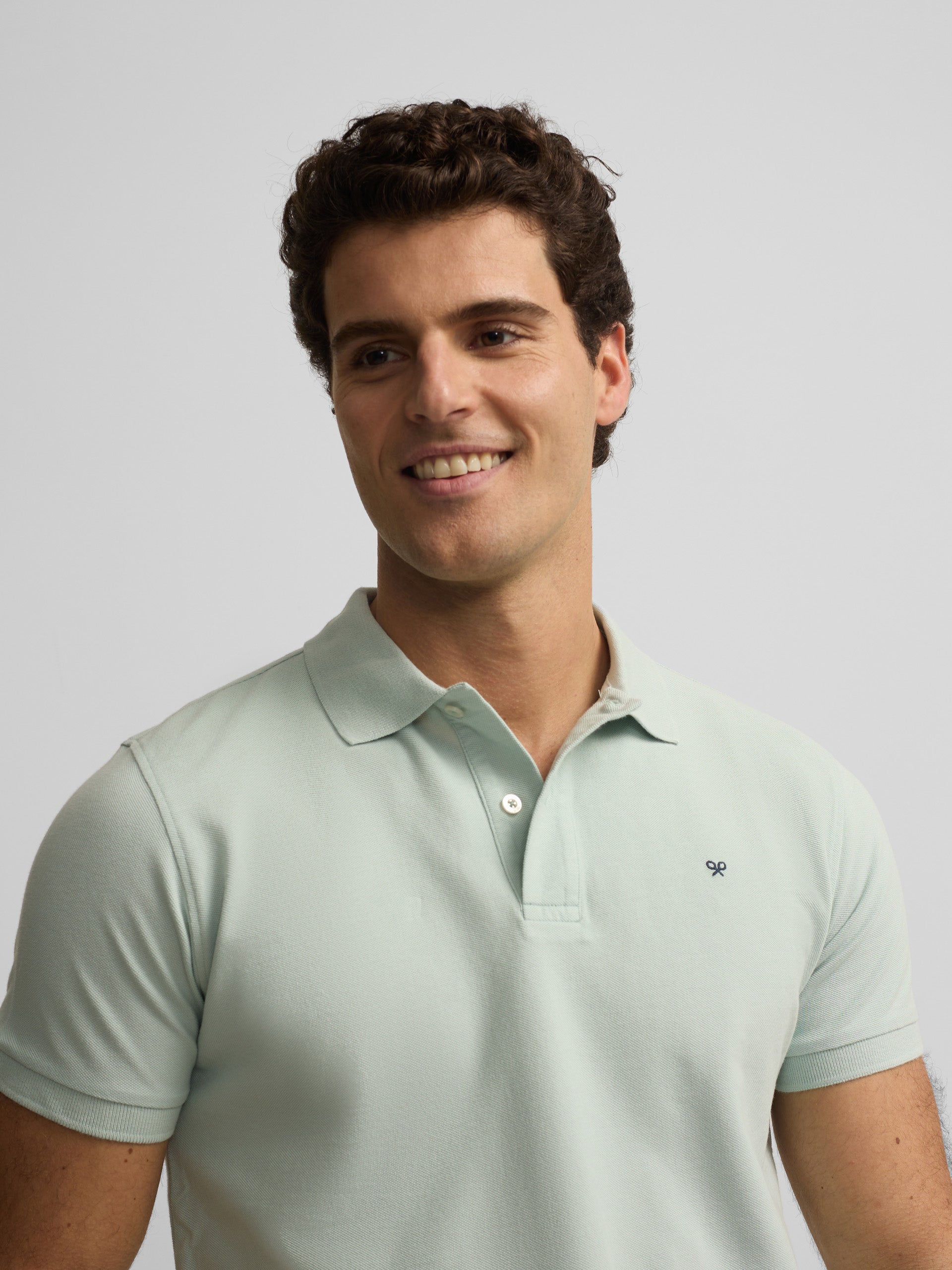 Polo clássico liso azul claro