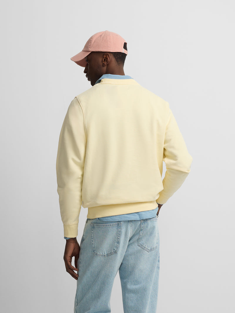 Sudadera silbon minilogo amarillo