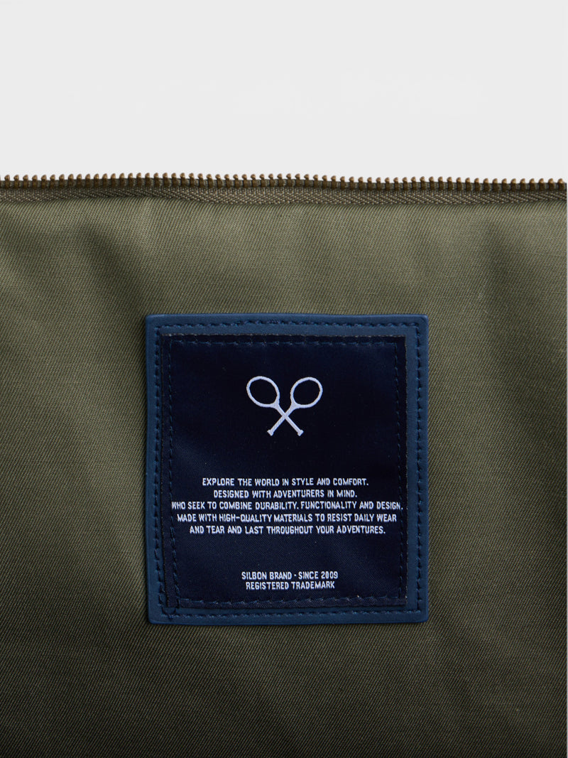 Sac de voyage avec détail en cuir vert