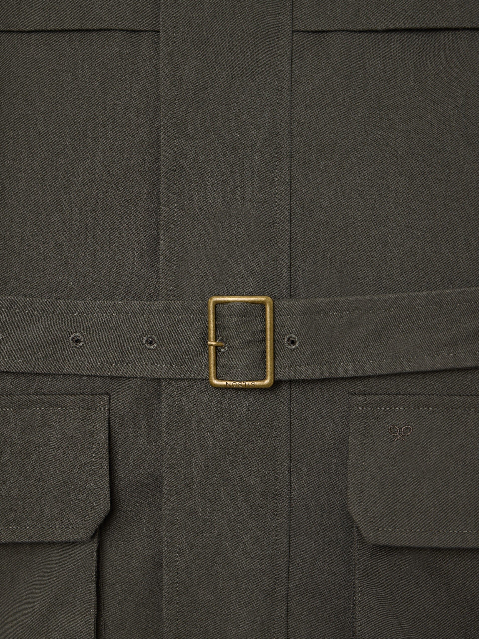 Casual jacket with green belt