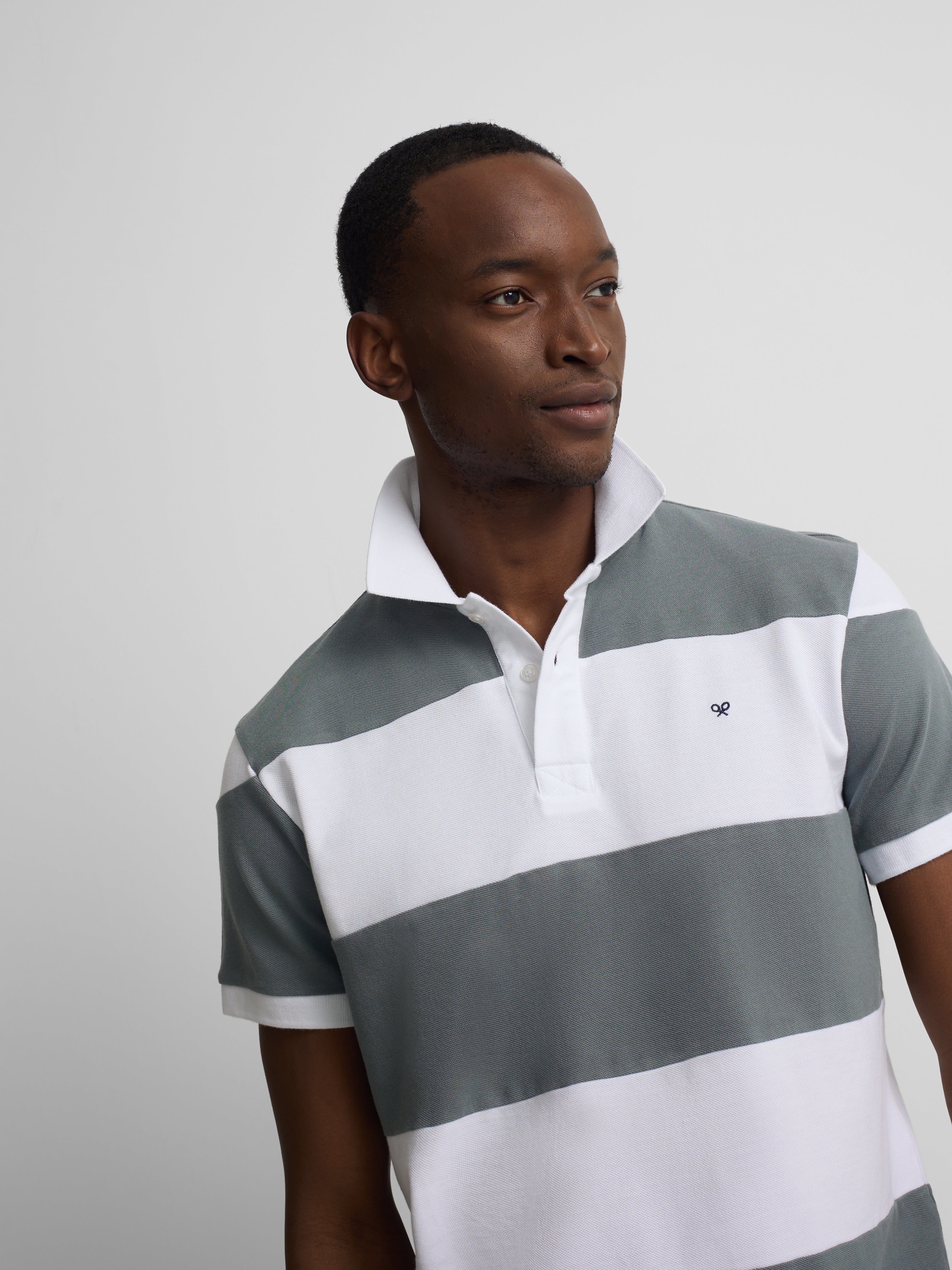 Polo manga corta rayas anchas azul petroleo