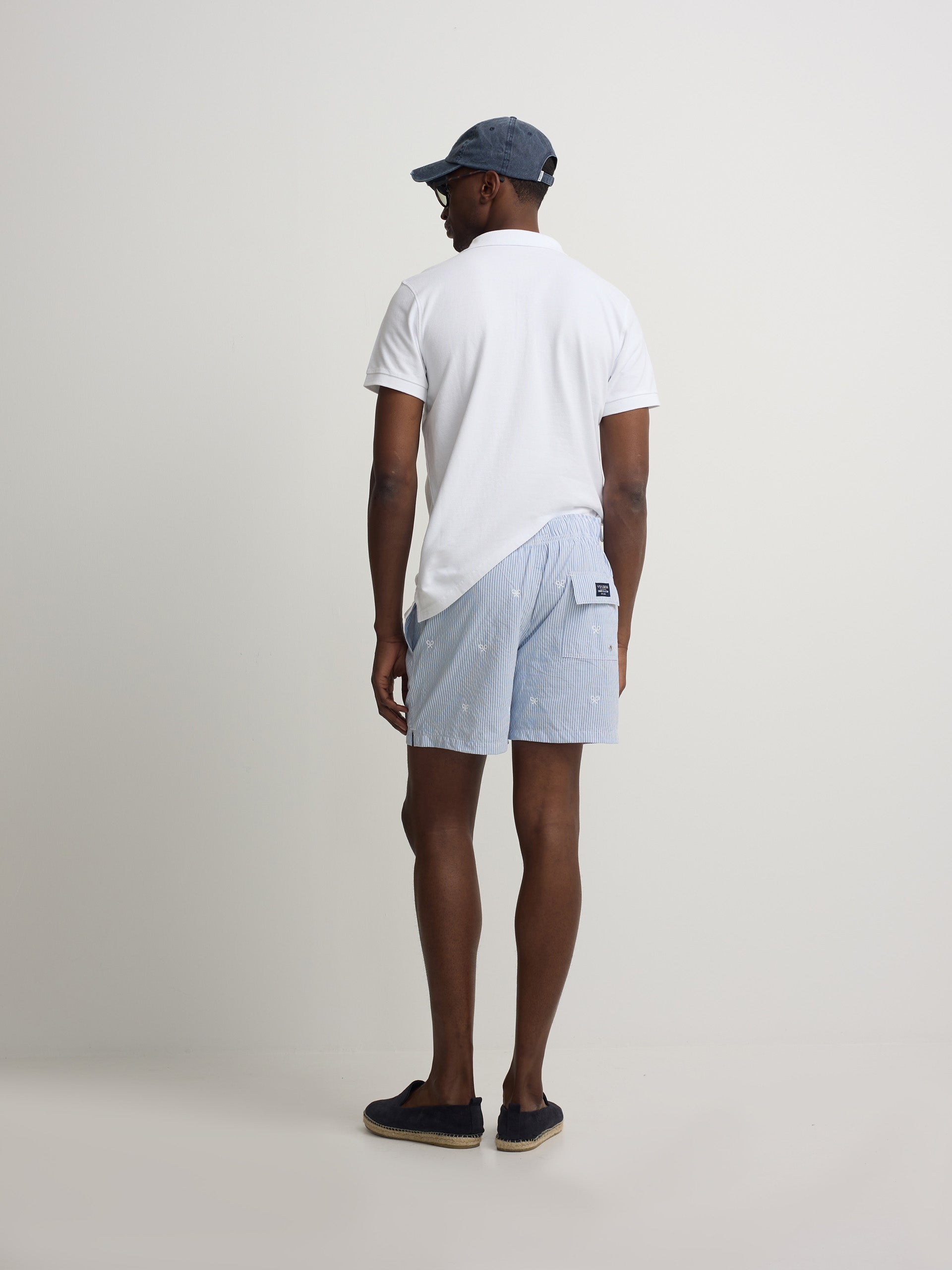 Bañador rayas finas logo azul claro