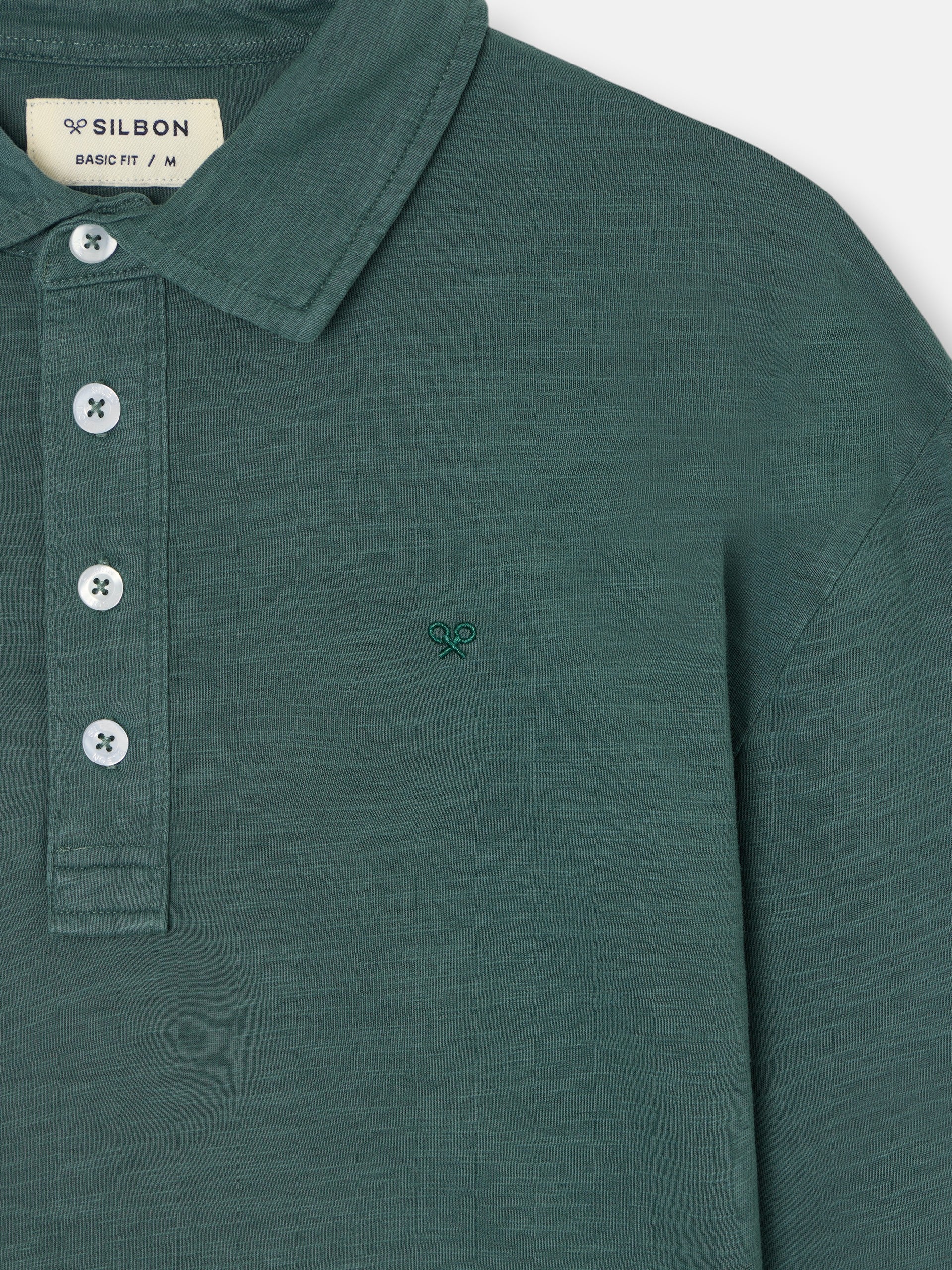 long-sleeved green polo shirt