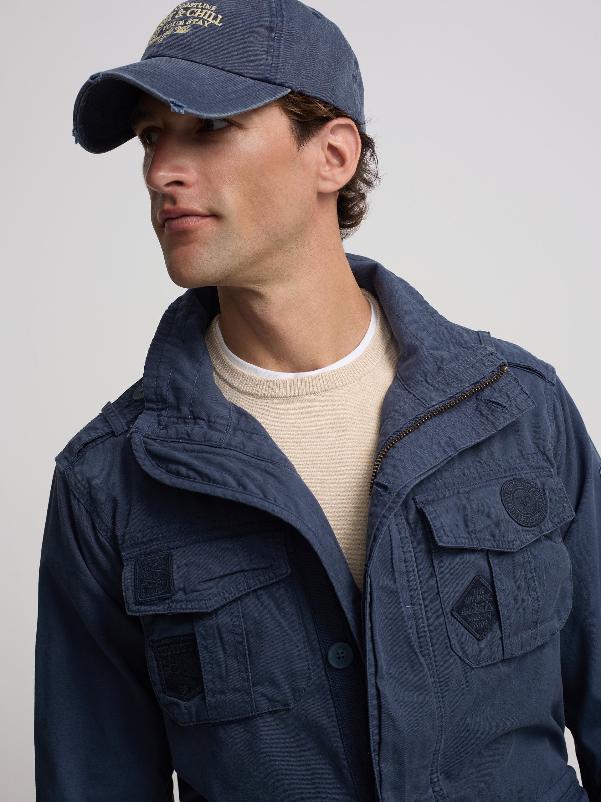 Navy blue patched parka