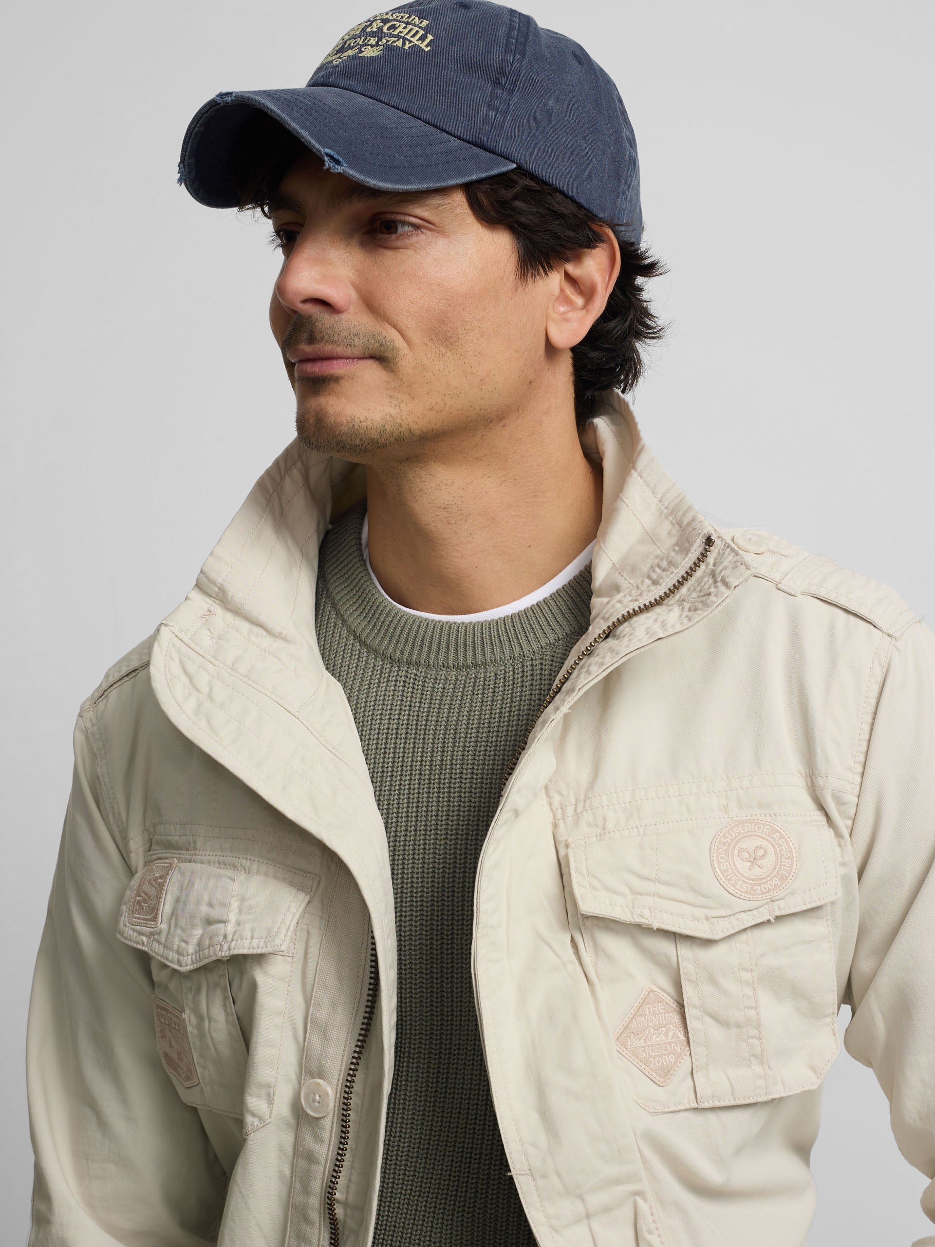 Parka com remendos pedra