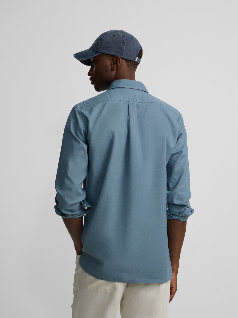 Polera sport lino petroleo