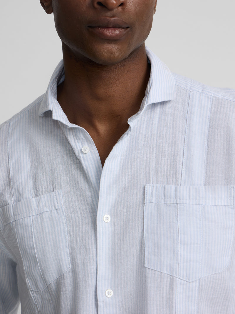 Guayabera desportiva de linho às riscas azul celeste