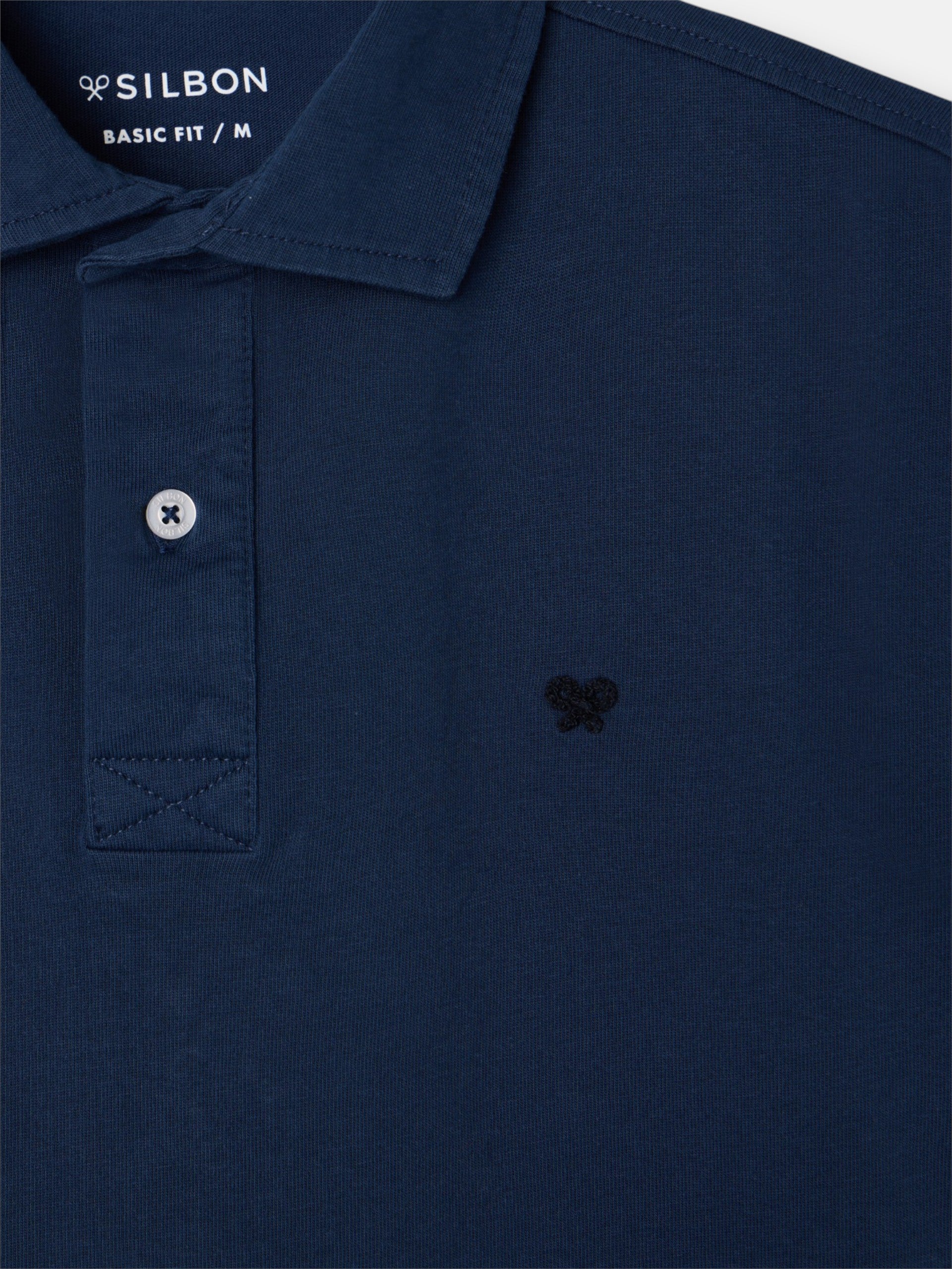 Polo manga corta logo relieve azul marino