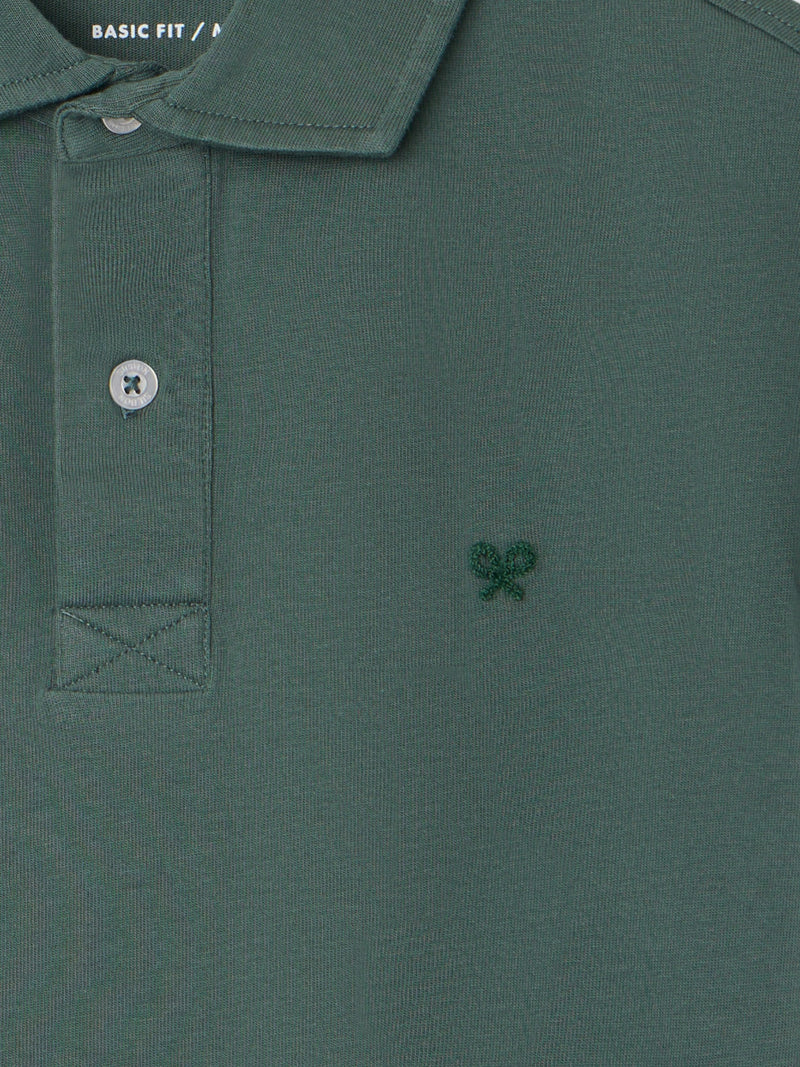 Short-sleeved polo with embossed green logo