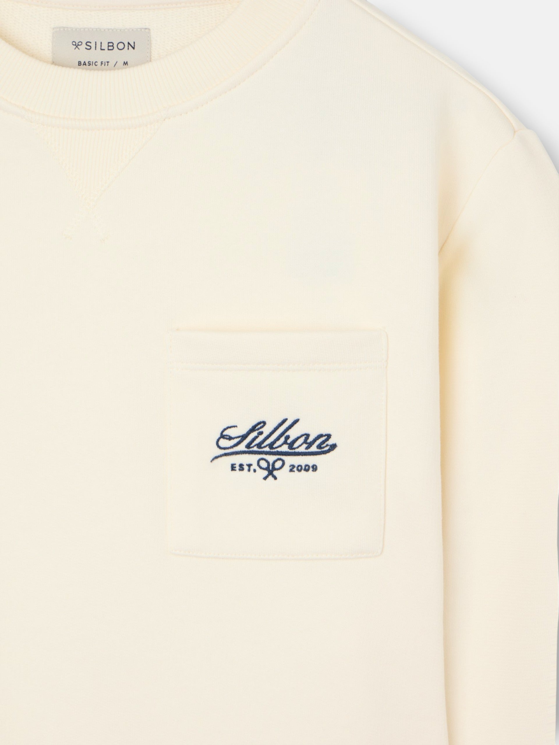 Sweat-shirt crème avec poche brodée