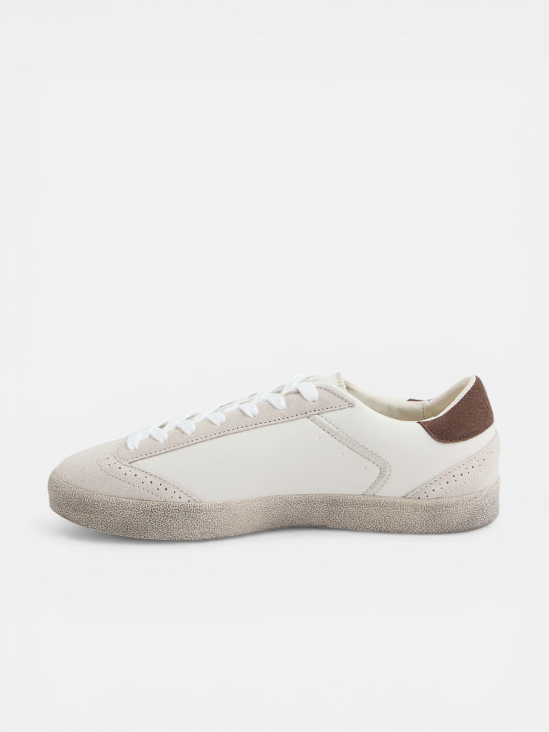 Worn stone sneaker