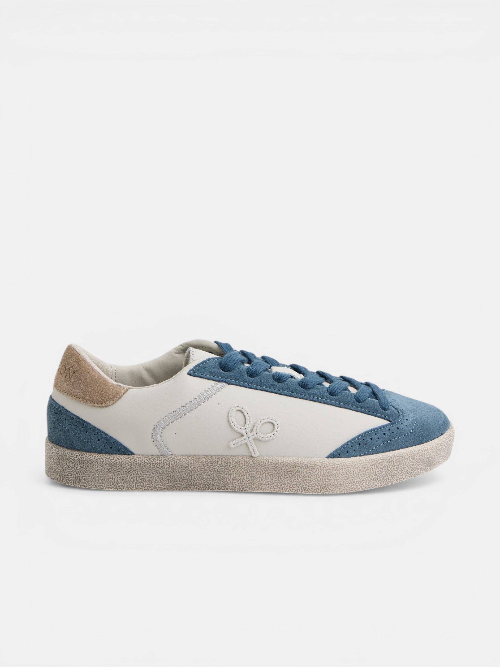 Zapatilla desgastada crema