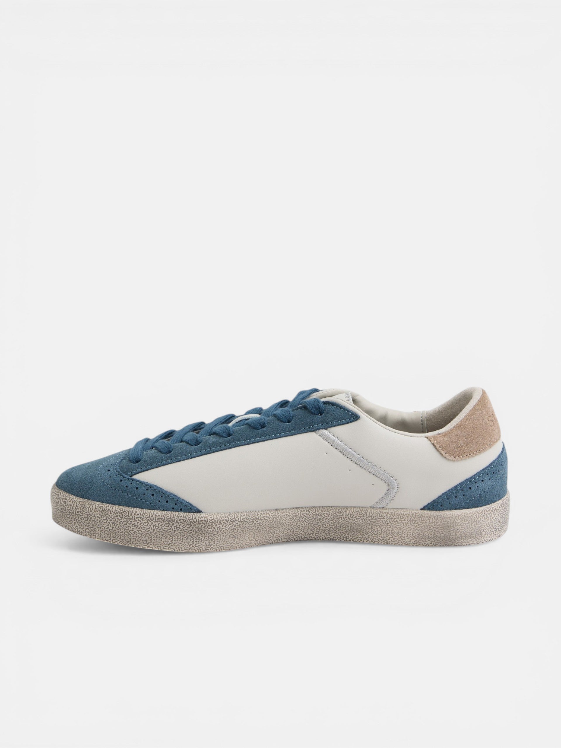 Zapatilla desgastada crema