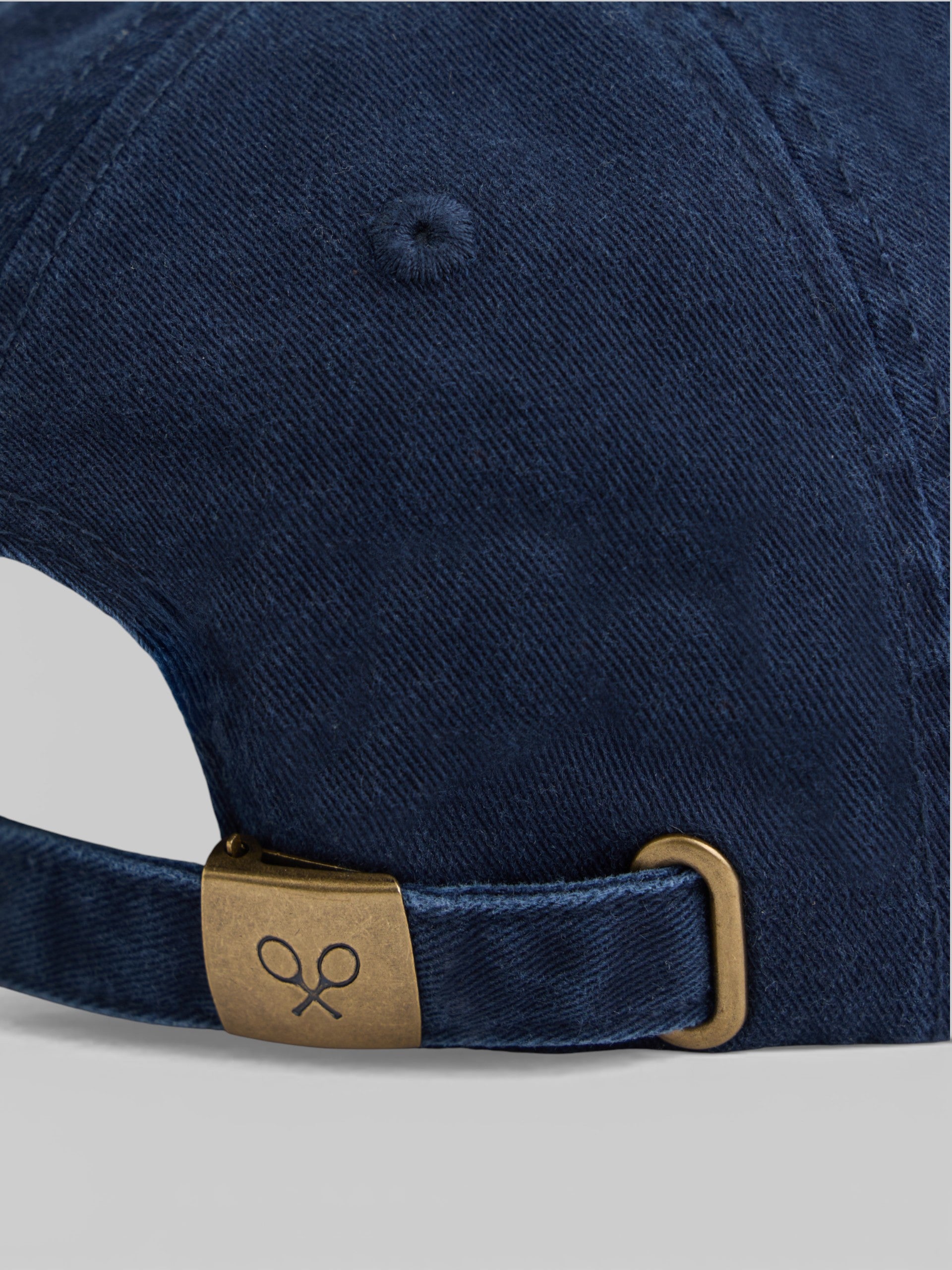 Navy blue embossed racket cap