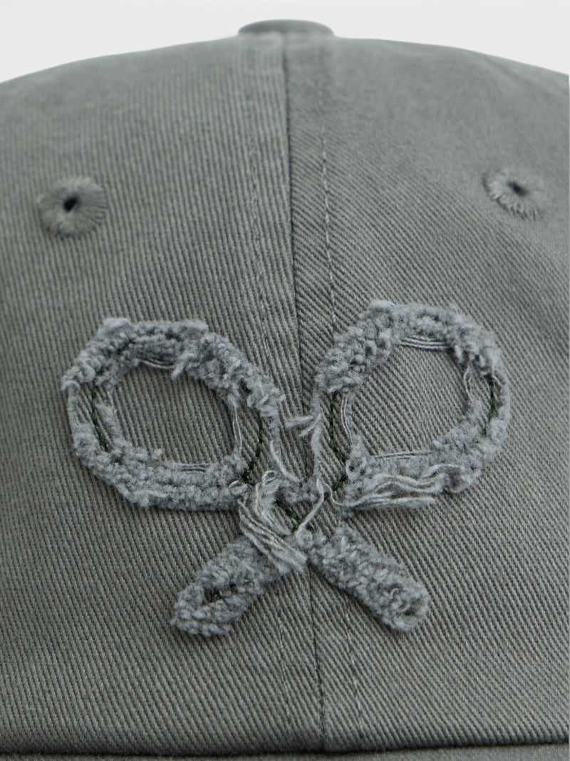 Green embossed racket cap
