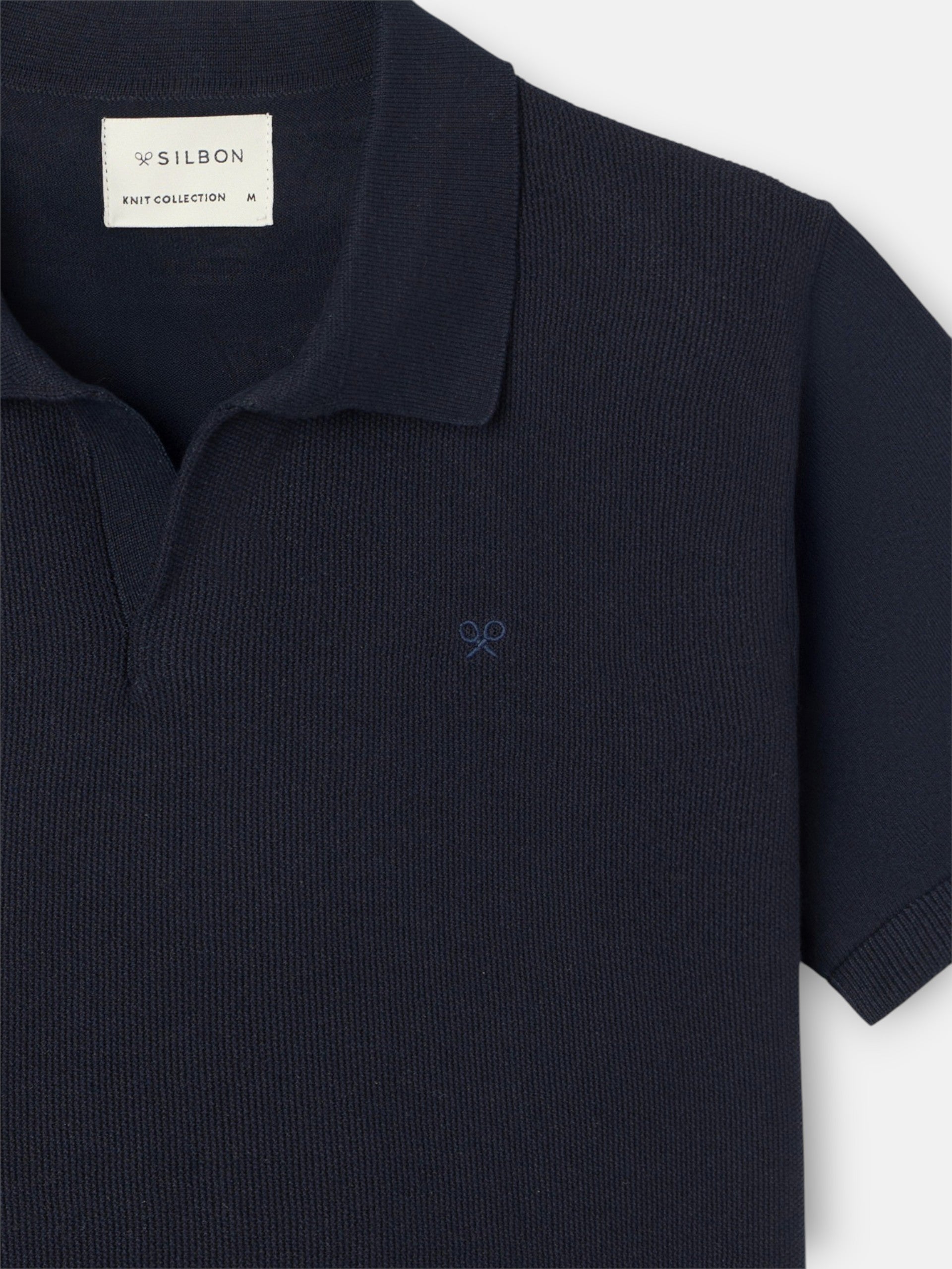 Polo unique estructura azul marino