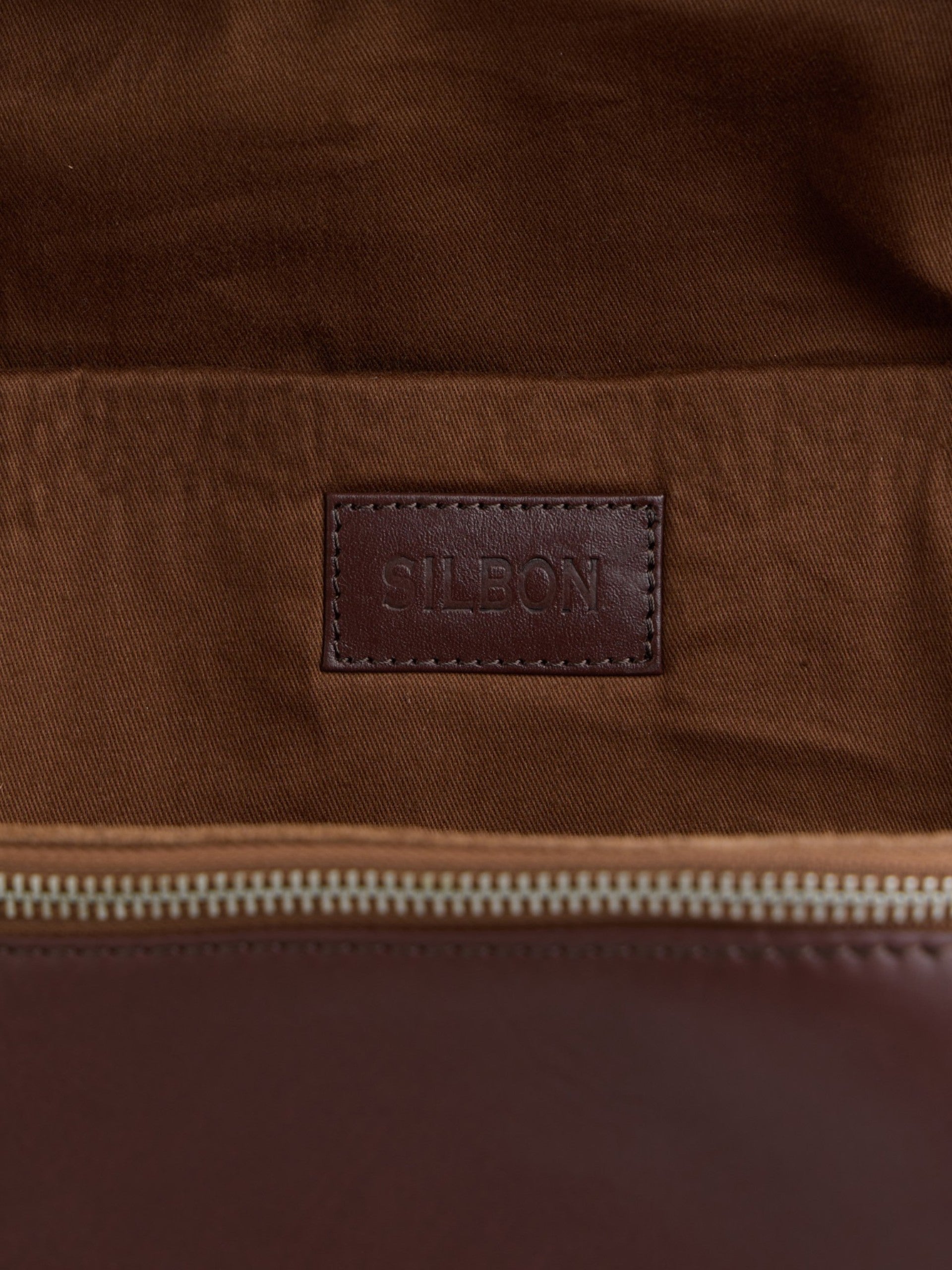 Dark brown leather business backpack