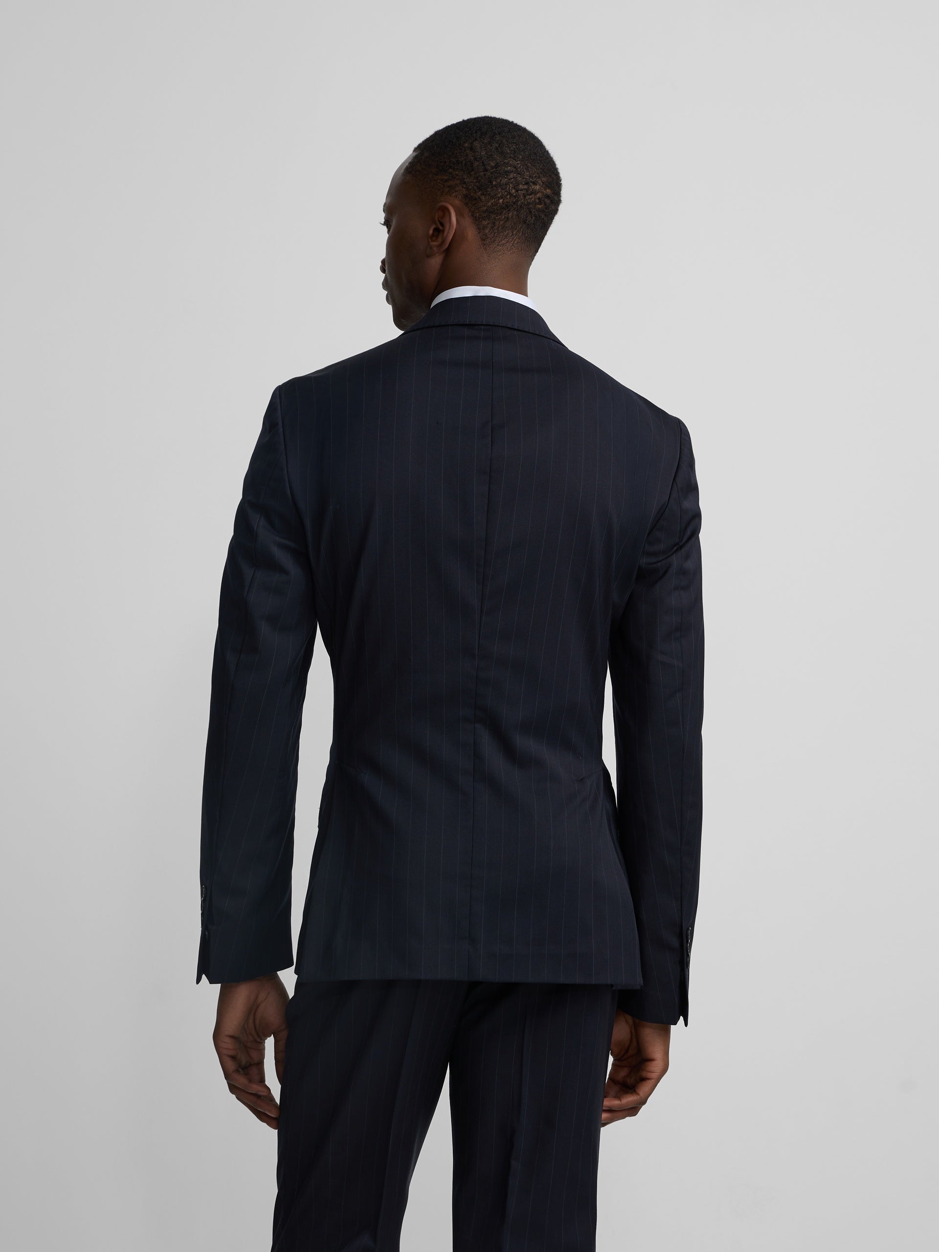 Navy blue pinstripe suit jacket