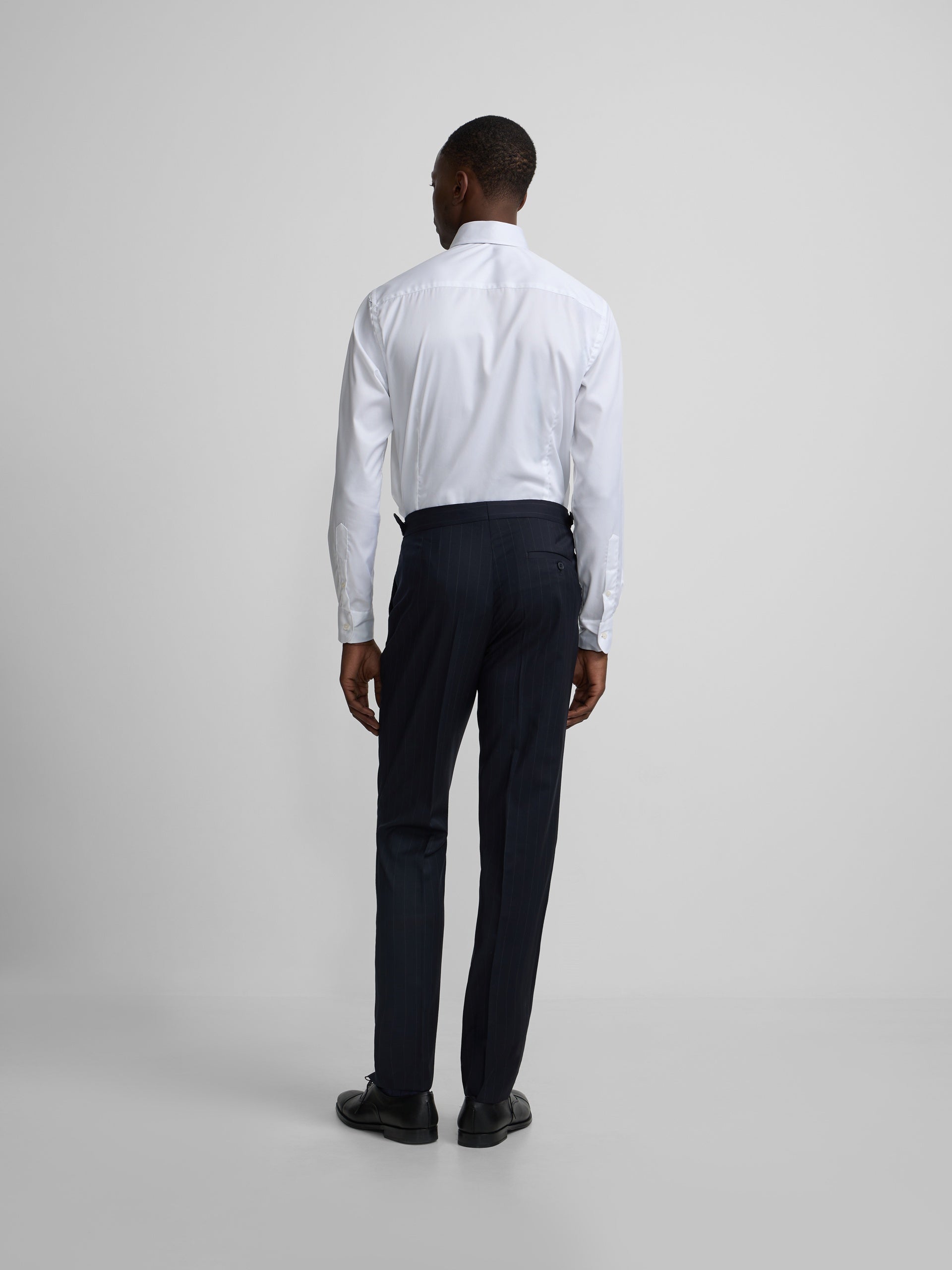 Navy blue pinstripe suit trousers