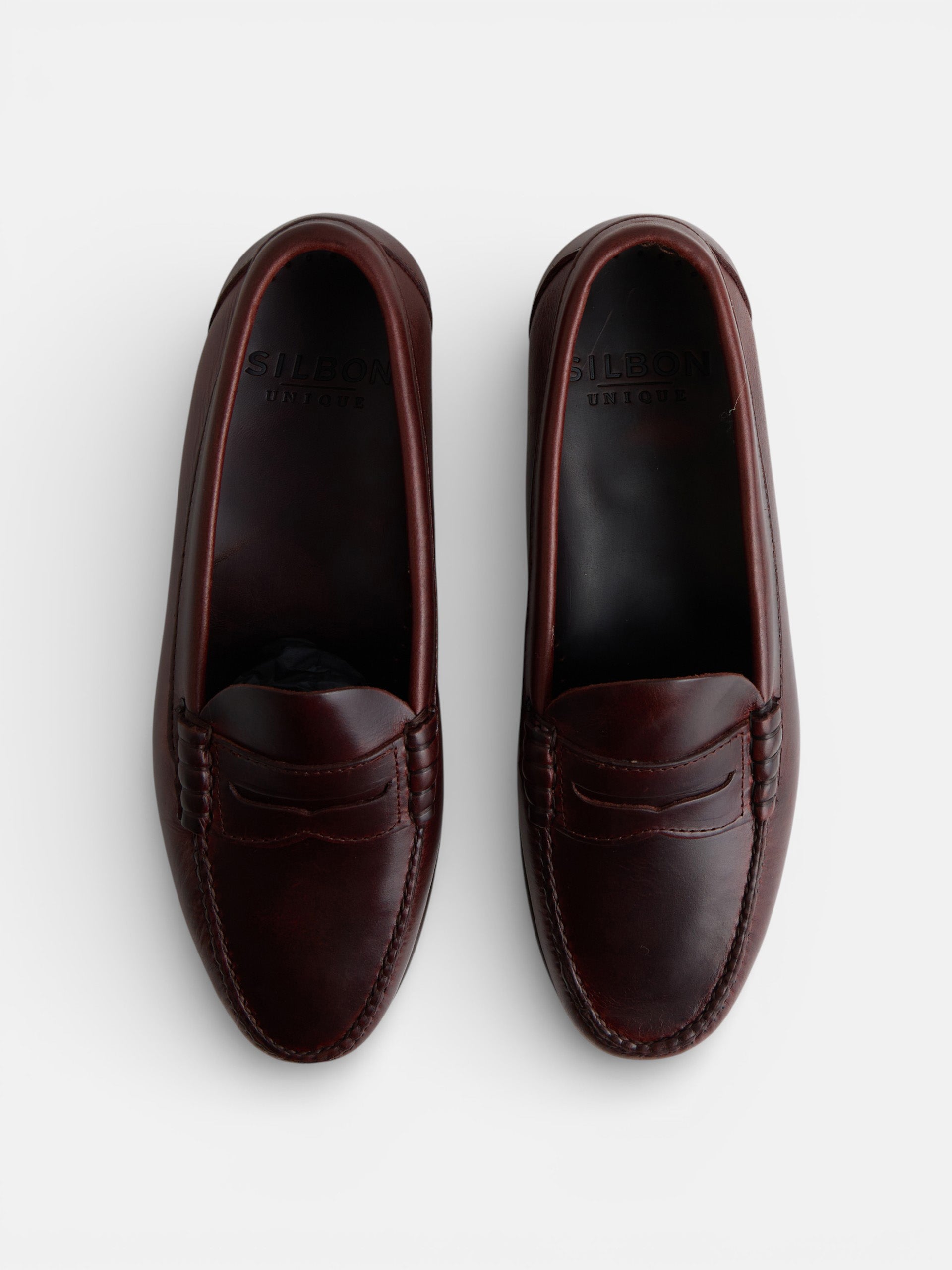 Premium brown leather penny loafer shoe