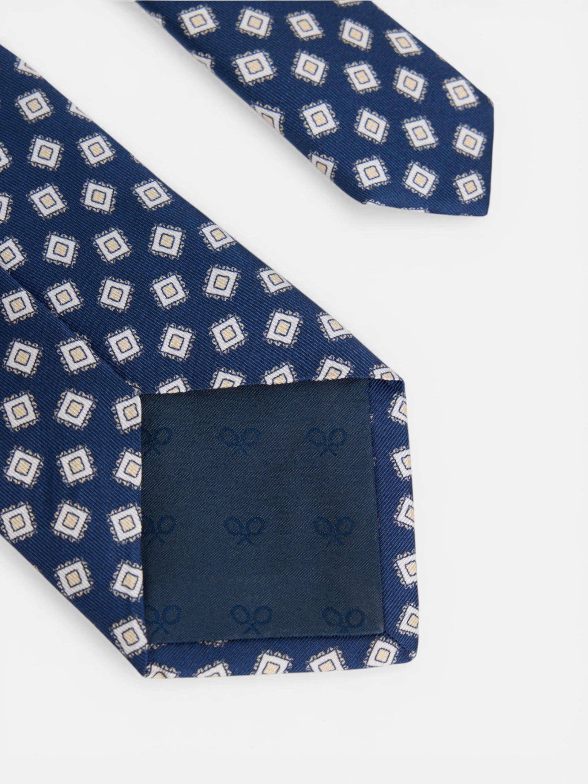 Cravate à motif de carrés irréguliers bleu marine