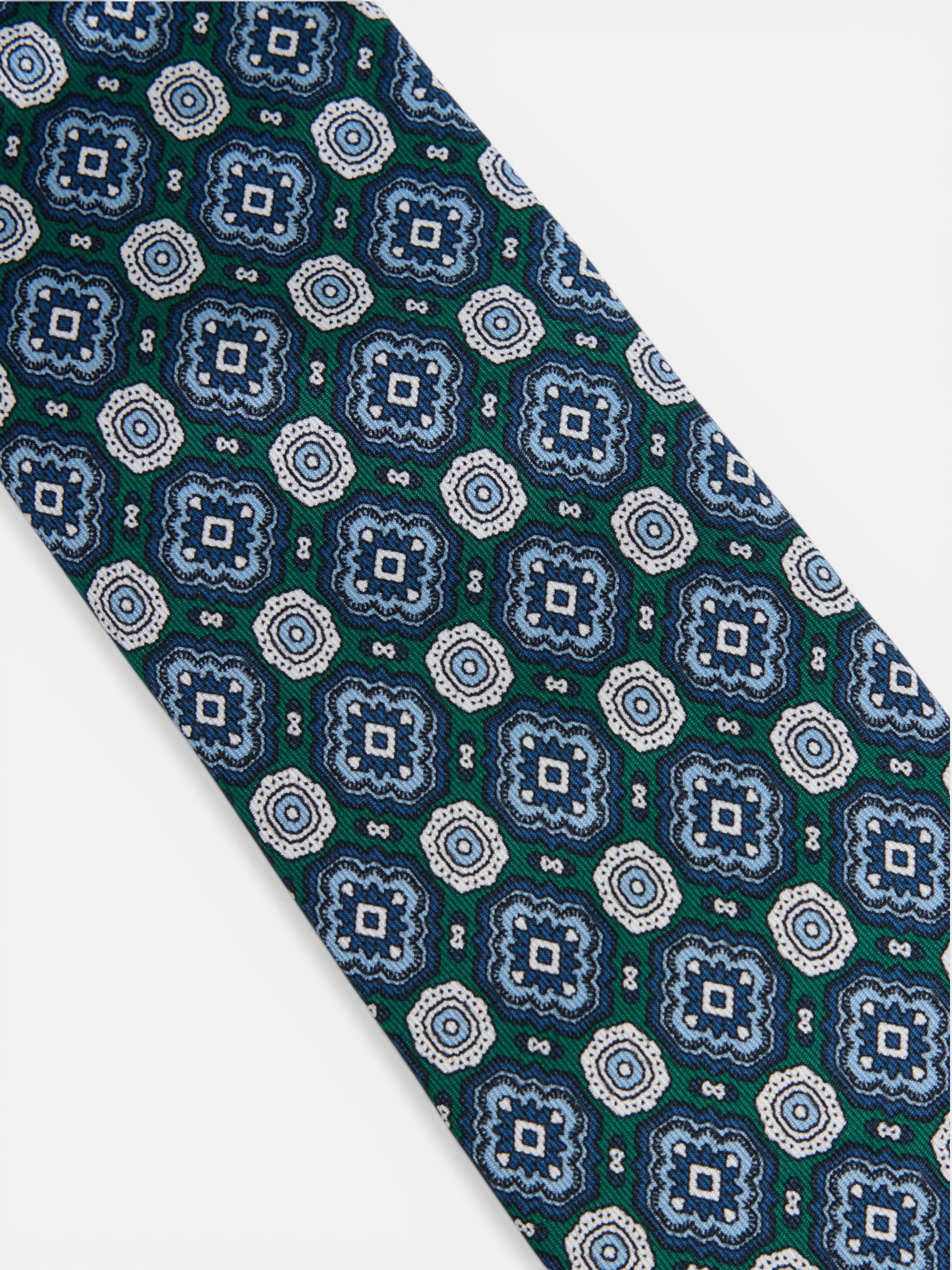 Cravate en soie motif carreaux de faïence verts