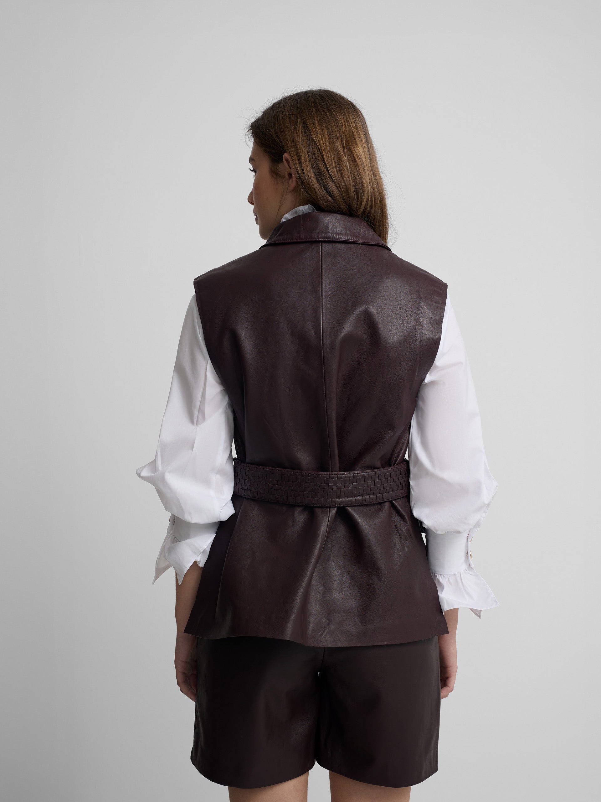 Chaleco piel trenzado burdeos