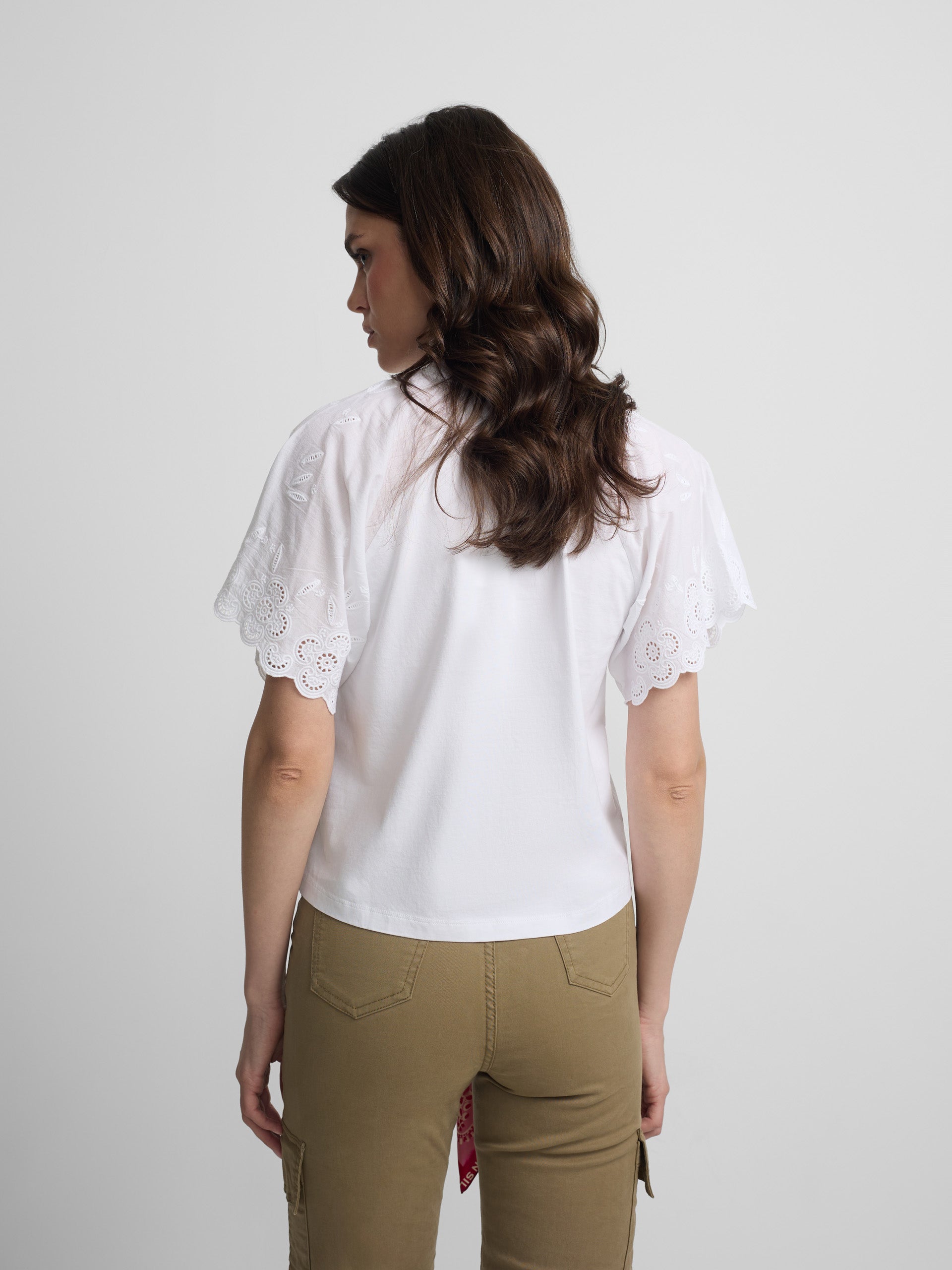Women's white t-shirt with embroidered ruffles