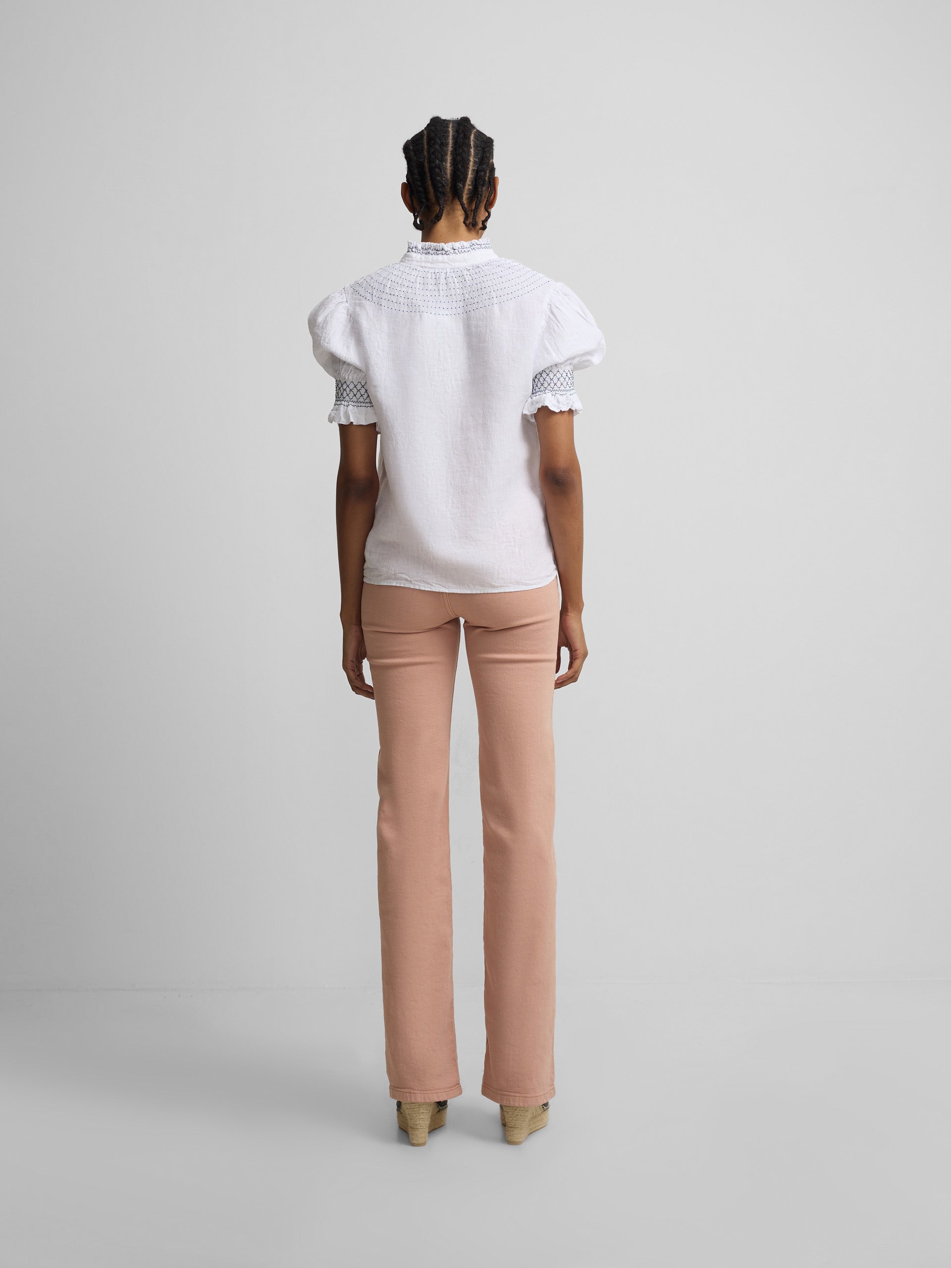 Calças de ganga com fivelas coral