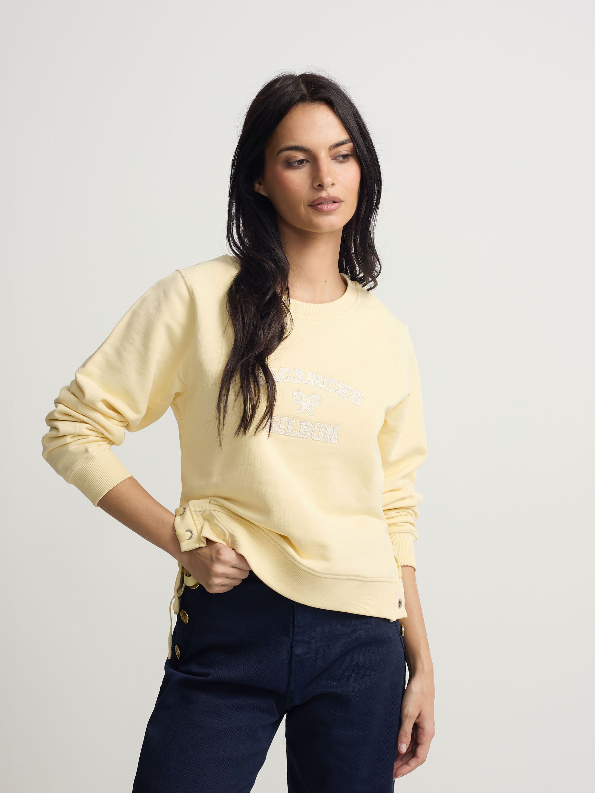 Sudadera woman detalle cuerdas amarilla
