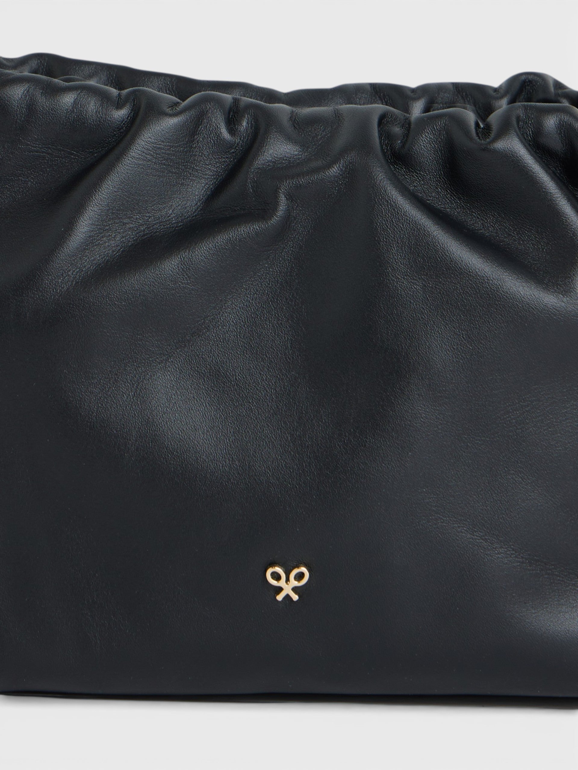 Gathered leather bag with chain detail in black