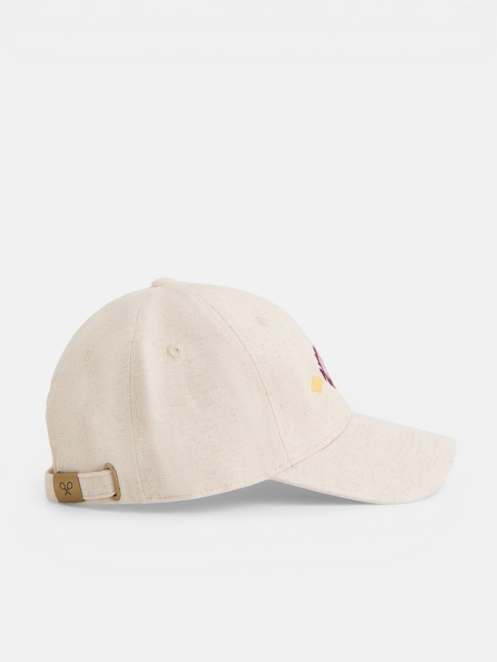 Beige cap with ethnic motif