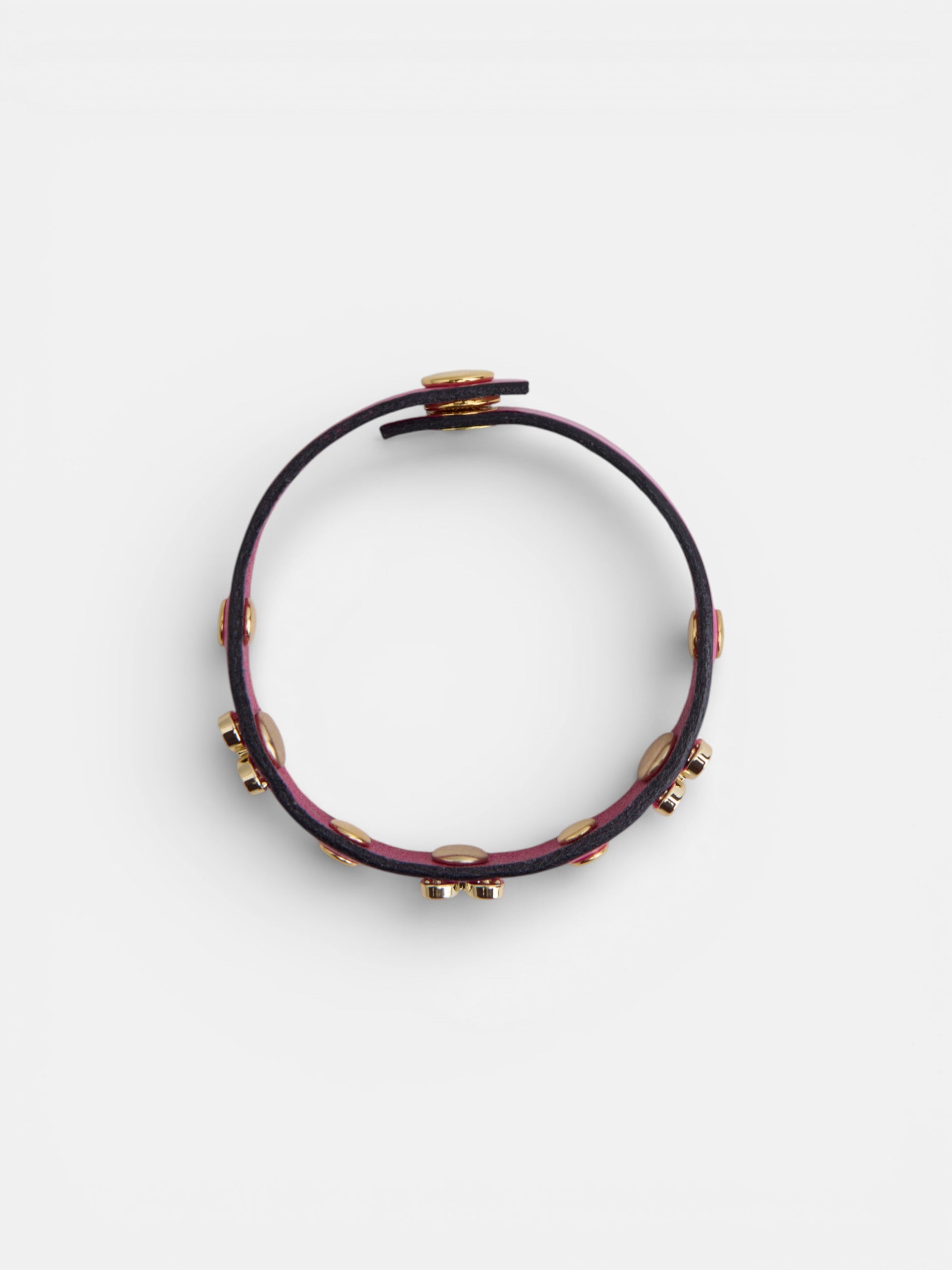 Pulsera piel logo y tachas rosa