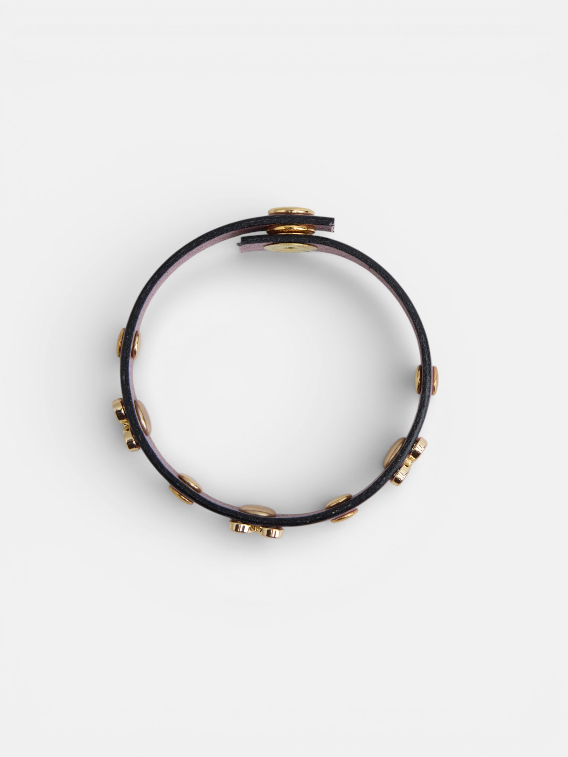 Pulsera piel logo y tachas malva