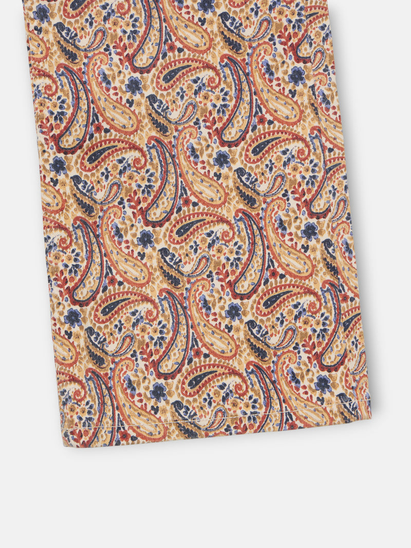 Calças de ganga estampadas com padrão paisley laranja
