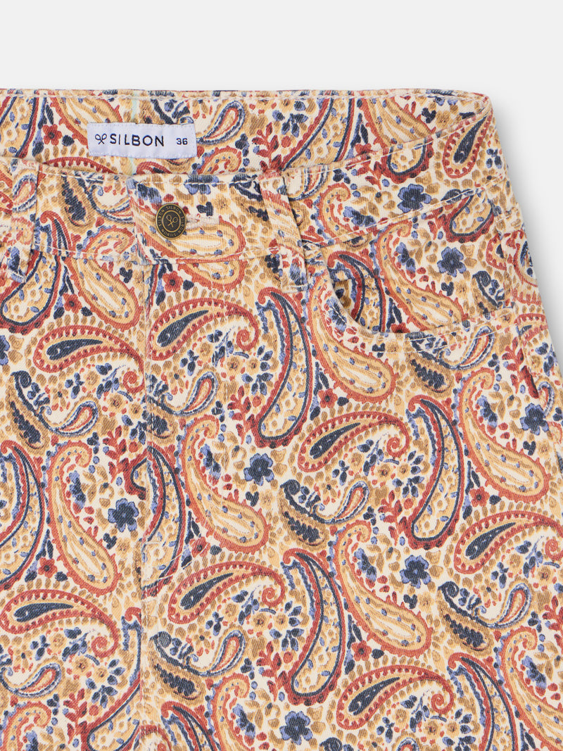 Calças de ganga estampadas com padrão paisley laranja